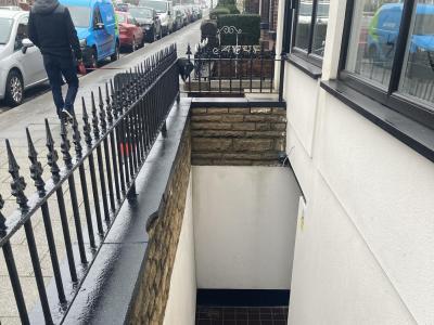 Steps down to bar