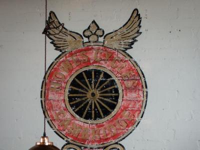 The old Howes emblem on the wall inside